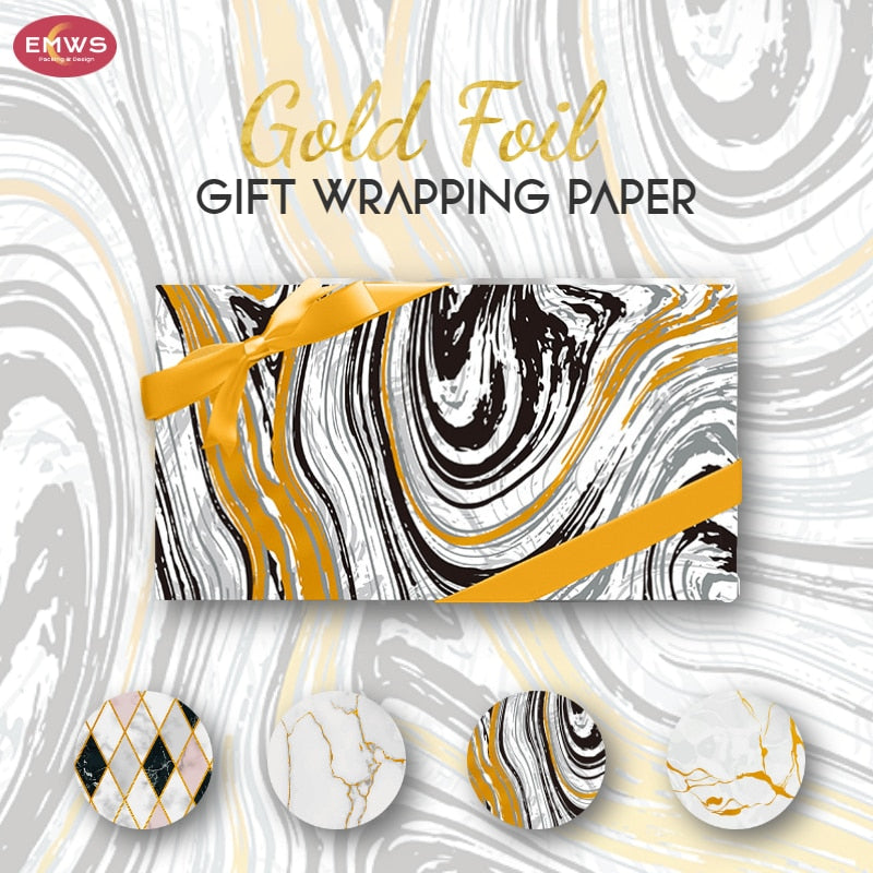 Is it marble? No. It just looks really cool-sort of like a marble statue, except it's a present wrapped in Gold Foil Granite and Marble Look Gift Wrap.