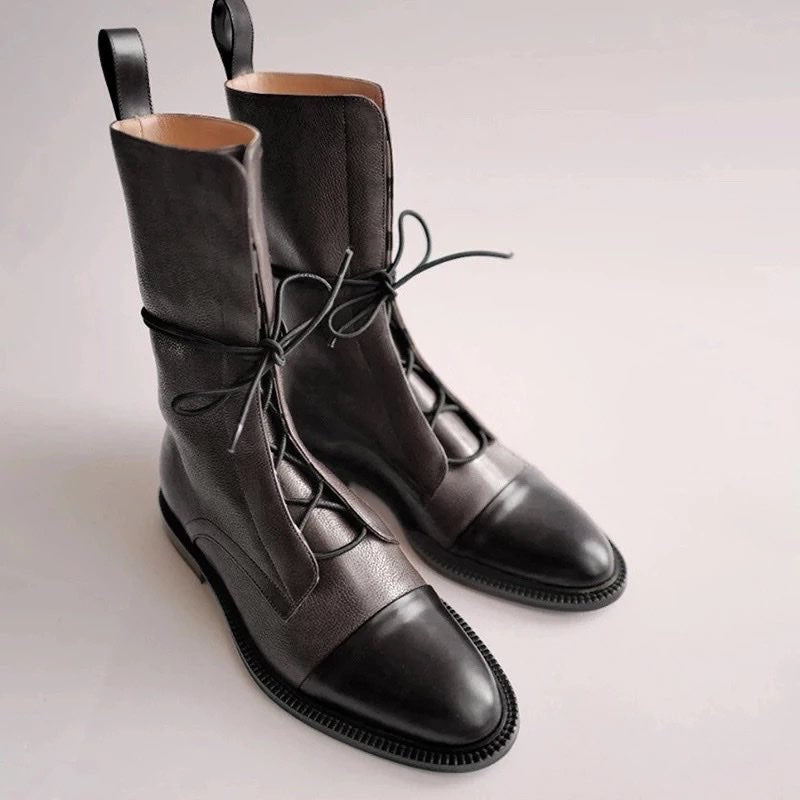 These are just some of those good looking things and your feet deserve them. That cute short dress and tights deserve them, too! This Comfortable Tie Up Leather Martin Style Ankle Bootie will also look great with leggings and boxy sweater!