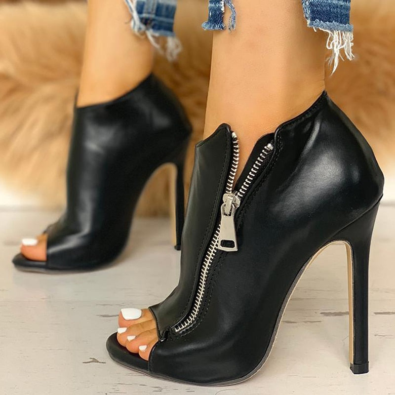 You could hear the whispers as she walked into the Masquerade Ball. Dominatrix? Maybe. But for this party more like Steampunk Cool Crow, Rockin' Evil Stepmother or (my favorite) Supernatural Sorceress. Black PU Peep Toe Pumps