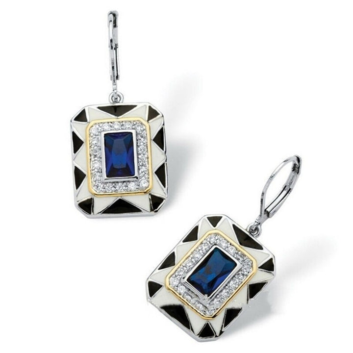 Authentically Art Deco said the Auction house president. He couldn't possibly know that my Blue Gem Art Earrings weren't the "real thing." Then again, why would anyone wonder?